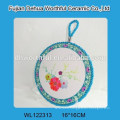 Flower design ceramic pot mat with blue rope